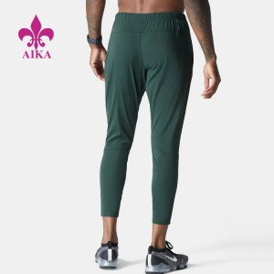 Tovární cena Velkoobchod Lehké Nylonové kalhoty Slim Fit Gym Jogger s logem pro muže