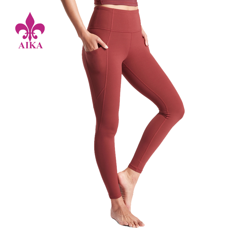 Roupa de ioga personalizada por atacado de fábrica – design de logotipo estampado de cintura alta leggins femininas com bolsos para calças femininas – AIKA