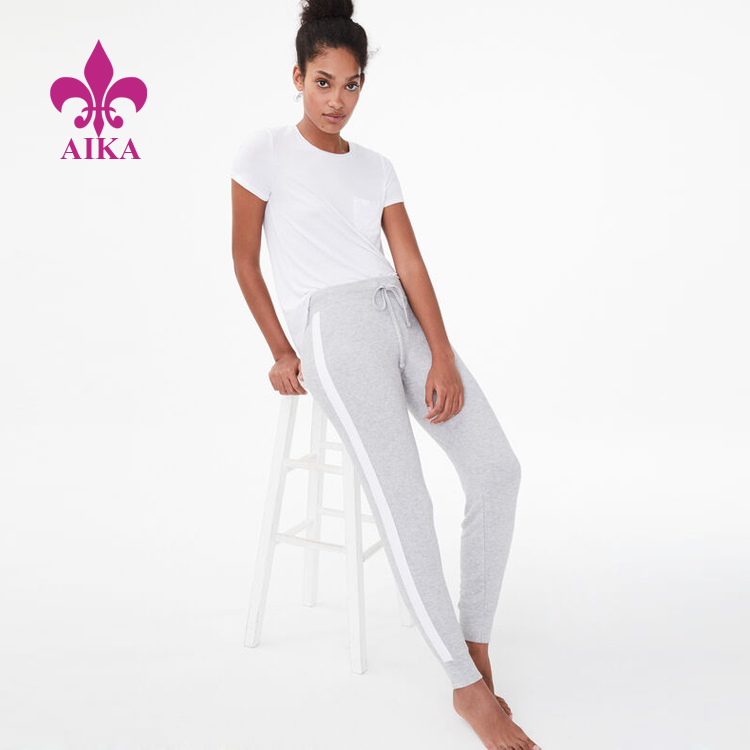Висококачествени персонализирани популярни спортни дамски панталони за джогинг със страничен детайл в бяло