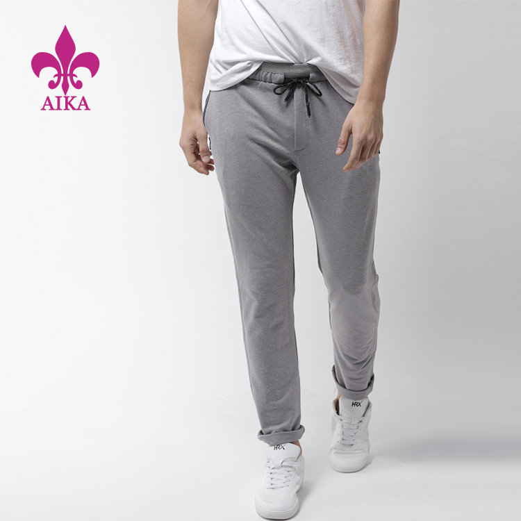 Fabrieksgroothandel Mode Heren Sportkleding - Aangepaste Groothandel OEM Hoge kwaliteit losse casual blanco elastische heren sportbroek met trekkoord - AIKA