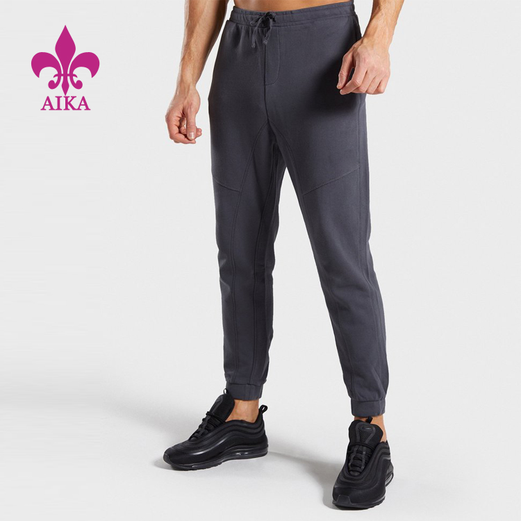 Fabriks bedst sælgende kompressionsbukser - engros fashion fit sport løs tilpasset atletik gym jogginglommer herrebukser – AIKA