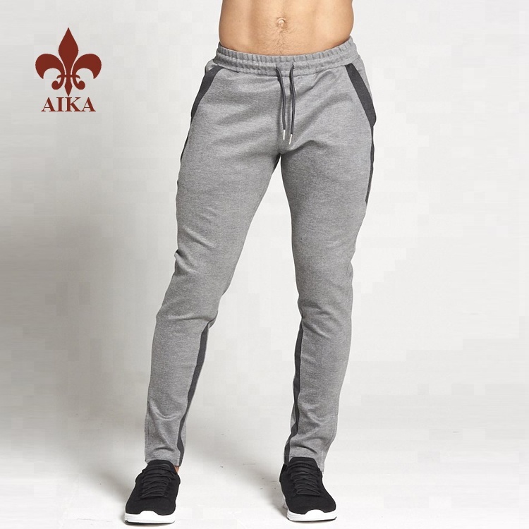 Vestit de roba esportiva dels millors proveïdors - Venda a l'engròs 2019 Pantalons de gimnàs de compressió prims per a entrenaments per a homes personalitzats - AIKA