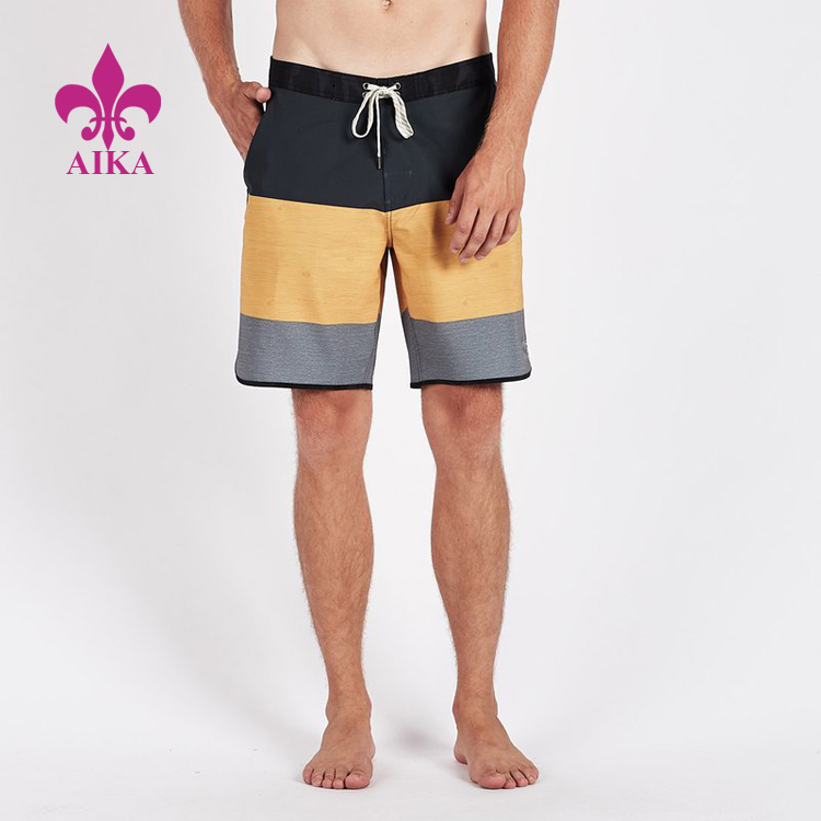 Hög kvalitet anpassade sommarstrand Casual Hidden Zip Pocket Patchwork Sports Gym Men Shorts