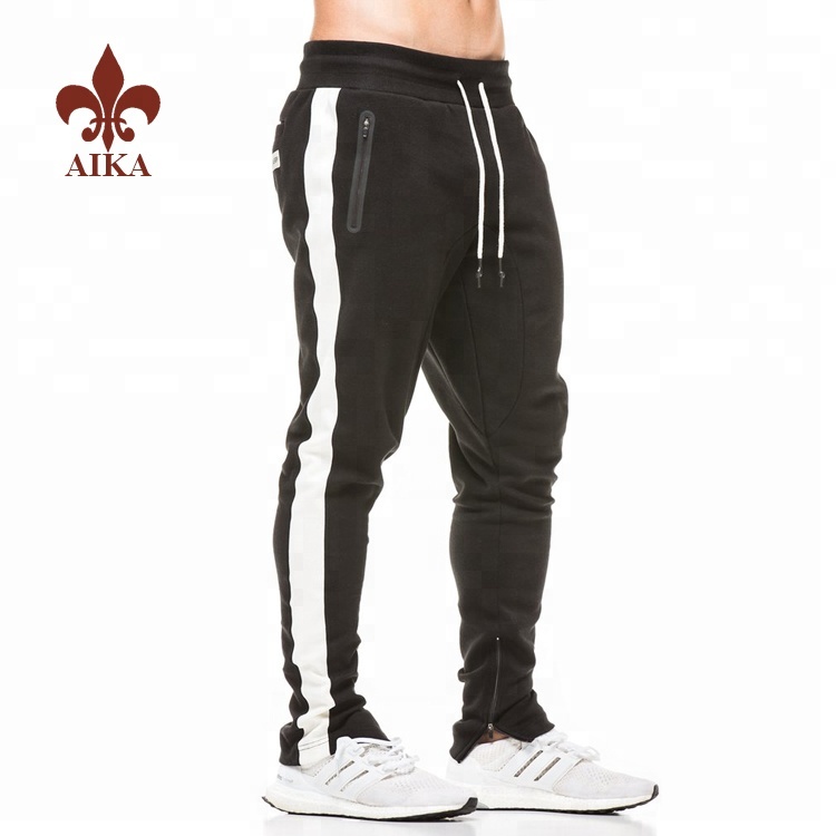 Tavalliset alennuskulut Yoga Pants Wear - Korkealaatuiset tukkumyynnissä räätälöidyt slim fit pudotushaara raidat miesten lenkkeilyhousut vetoketjulla - AIKA