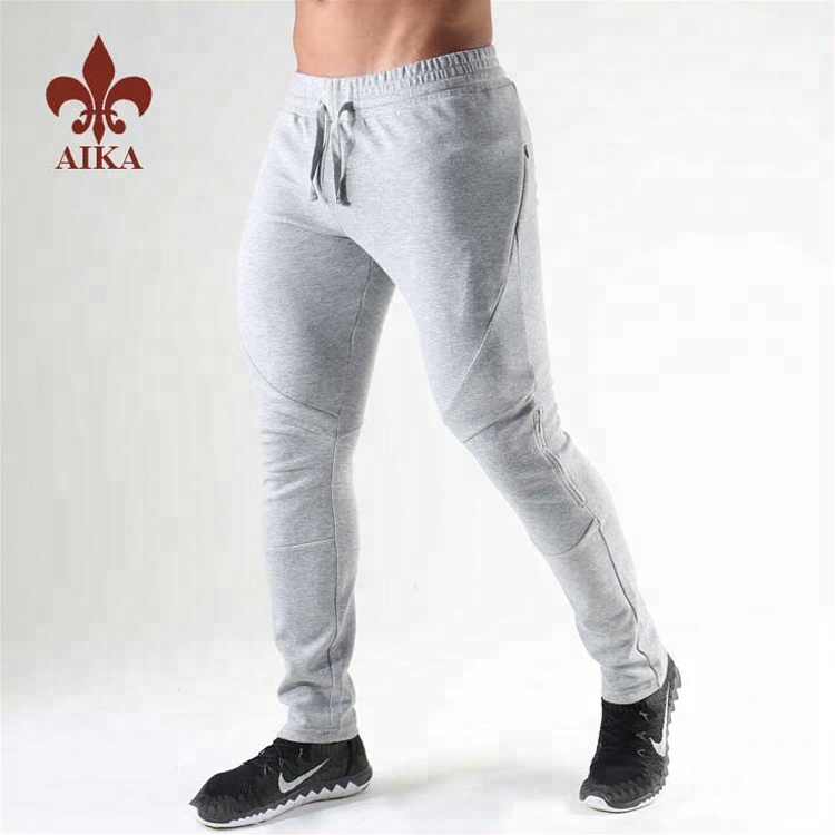 Calças esportivas masculinas baratas de fábrica - calças esportivas lisas personalizadas de algodão e poliéster por atacado - AIKA