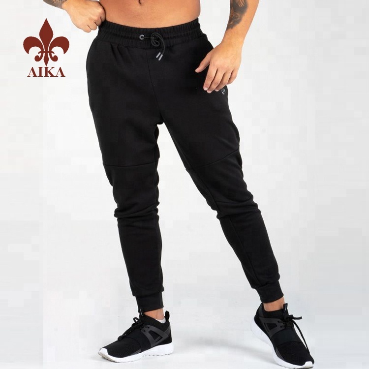 Augstas veiktspējas bikšu apģērbs — 2019. gada jaunākā dizaina modes aktīvais apģērbs Pielāgoti vīriešu skriešanas bikses, melnas, tukšas – AIKA