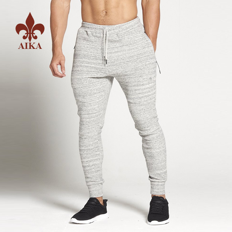 Pantalóns subministrados por fábrica - Pantalóns de lapis de ximnasia para homes de algodón por xunto de roupa deportiva personalizada de alta calidade - AIKA