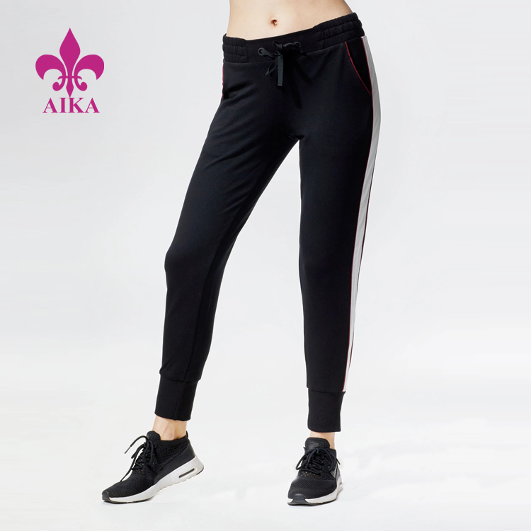 Design speciale per abbigliamento casual personalizzato - Abbigliamento sportivo da donna personalizzato di alta qualità Pantaloni da jogging a righe laterali in morbida spugna francese - AIKA