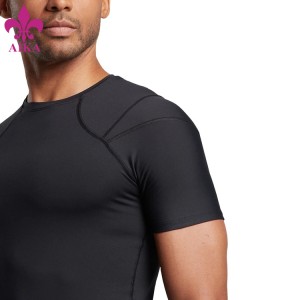 សំលៀកបំពាក់លក់ដុំកន្លែងហាត់ប្រាណពាក់អាវហាត់ប្រាណកំពូល Nylon Spandex Men Compression Gym T Shirt