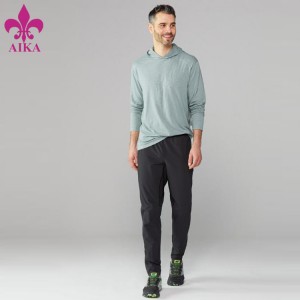 Aangepaste fitnesskleding T-shirt Lange mouw afdrukken Vingergat Lichtgewicht hoodie-shirt voor heren