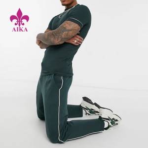 Exportador en liña Jogger de algodón de ximnasia - Pantalóns de chándal verdes con franxa lateral de cor lisa estampado de logotipos deportivos para homes - AIKA