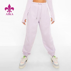 Bedst sælgende Active Wear Snørebånd Talje Kvinder 100 Bomuld Oversized joggerbukser med lynlåslomme
