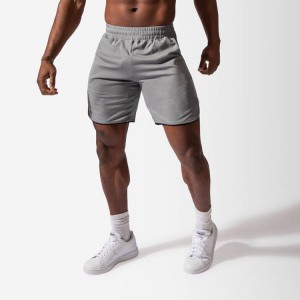 Vochtafvoerende 100% polyester elastische taille heren basketbal gym shorts met zak