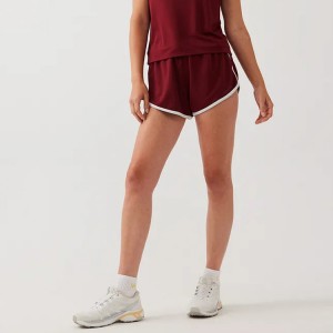 Pantaloncini da corsa in ginnastica atletica per donna in cintura regolabile in tessuto di maglia OEM