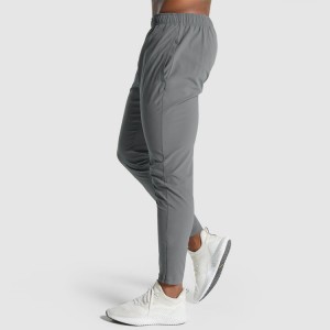Høykvalitets fireveis stretch-snøring på innsiden Slim Fit Nylon joggebukser for menn