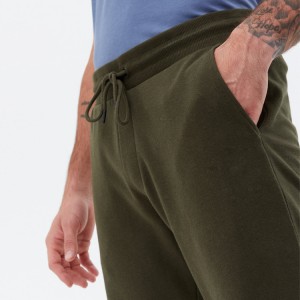 Оптові чоловічі спортивні штани з кишенями з французької махрової бавовни на талії