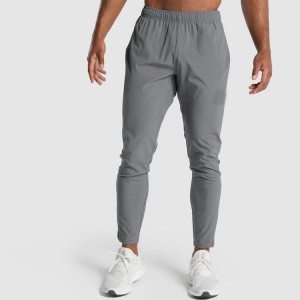 Visokokakovostne štirismerno raztegljive vrvice znotraj ozkih najlonskih jogger hlač za moške