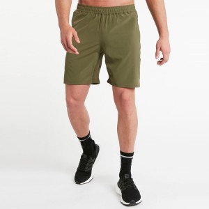 Groothandel zweetafvoerende elastische taille mesh paneel mannen gym atletische shorts met ritszak