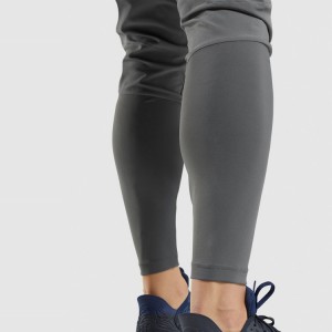 Pantaloni sportivi in ​​​​poliestere ad asciugatura rapida Tasca in vita Pantaloni da jogging personalizzati slim fit per uomo