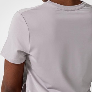 Високоякісні спортивні футболки з поліестеру для вбирання поту з розрізаним подолом у тренажерному залі, індивідуальний друк для жінок