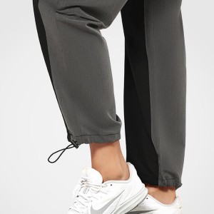 Engros lettvekts 100% polyester snøring Bunn Color Block Sports joggebukser for kvinner