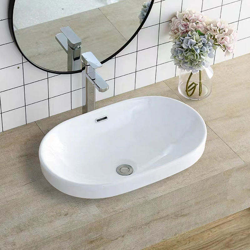 Овална бяла полувградена керамична художествена мивка за баня