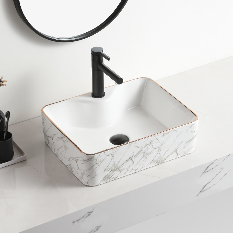 Lavandino in ceramica di nuovo design, vasca per lavabo in marmo, sul bancone