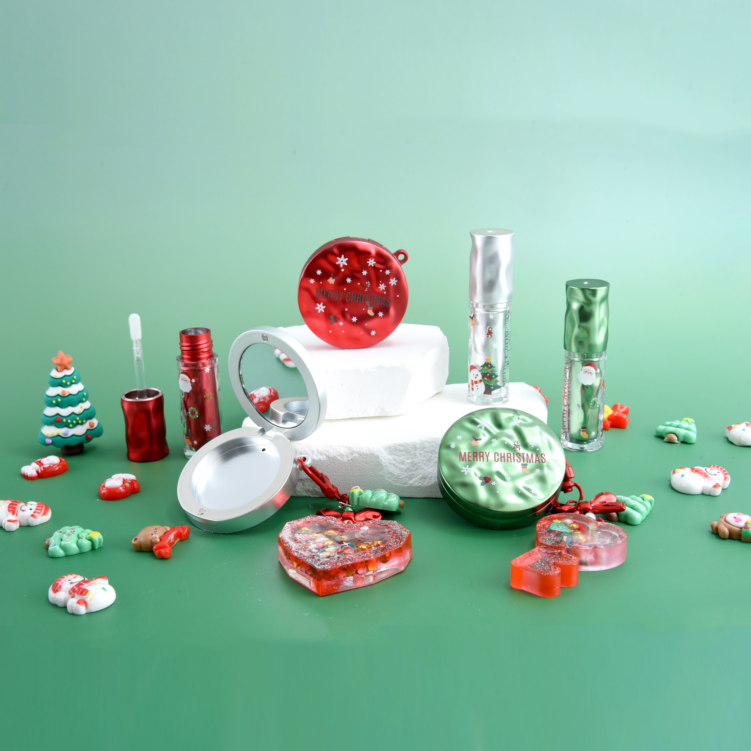 Conxunto de envases de cosméticos de Nadal con acabado en ondas de auga para recipientes de blush magnético e tubos de brillo de beizos Imaxe destacada