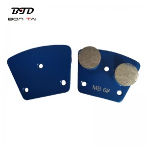 Trapezoid concrete grinding shoes with double round segments