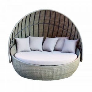 Okrągłe wiklinowe łóżko do opalania z baldachimem