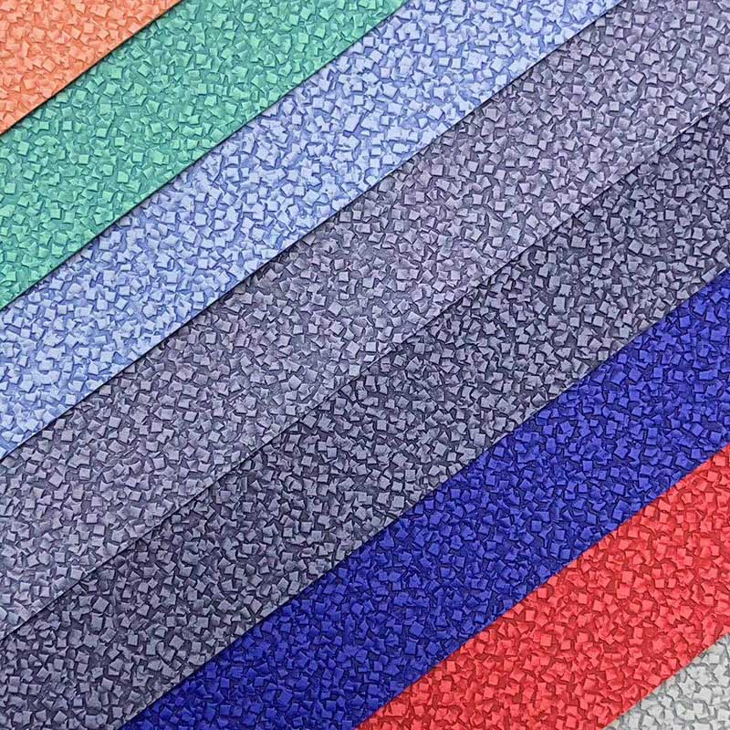 Nieuw ontwerp rubik's kubus patroon grind textuur reliëf PU leer voor telefoonhoesjes