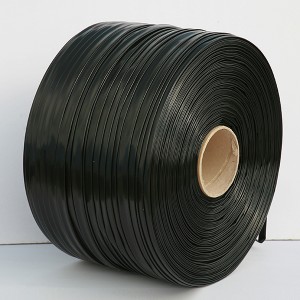 Inlaid patch type drip irrigation tape