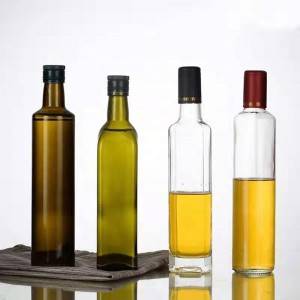 Zelené sklenené fľaše na olivový olej s uzáverom