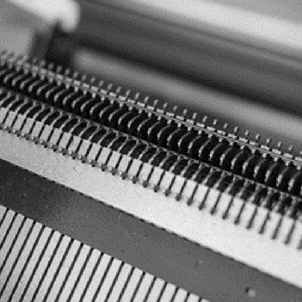 Have you tried a knitting machine?