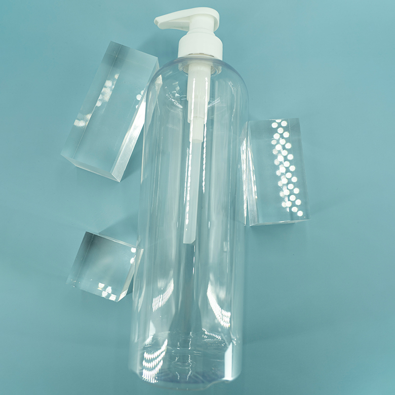 पंप के साथ खाली प्लास्टिक पीईटी गोल पारदर्शी बोतल 1000 मि.ली