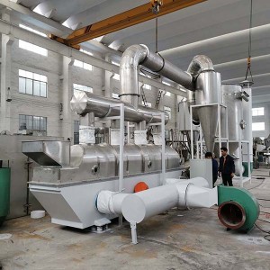 Continuous horizontal vibrating fluid bed dryer