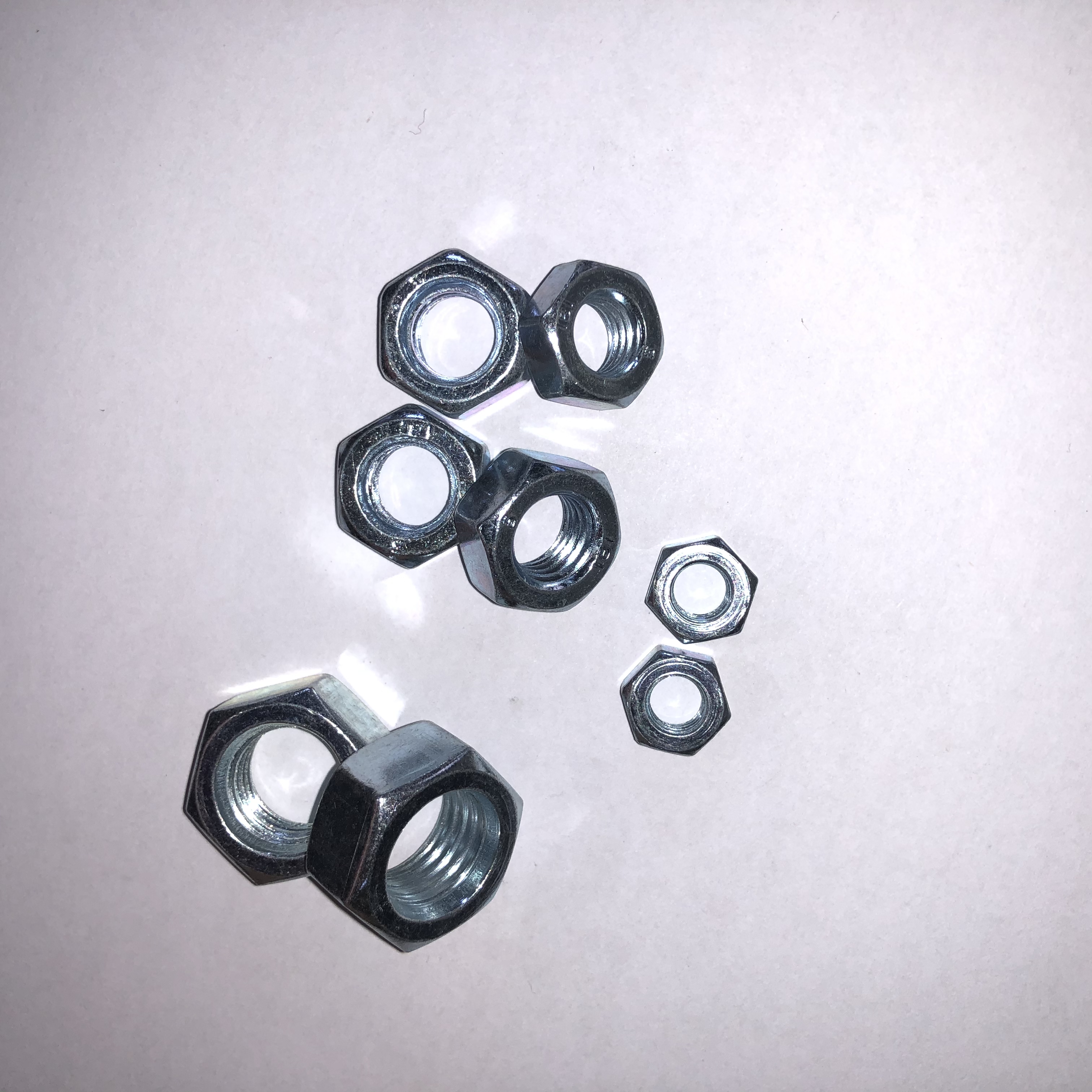 I-DIN934 HEX NUT Ipuleti le-Zinc le-carbon steel nut ne-bolt grade 4.8 6.8 8.8 10.9 12.9