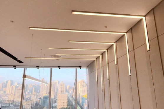 How are linear lighting fixtures installed in office spaces?