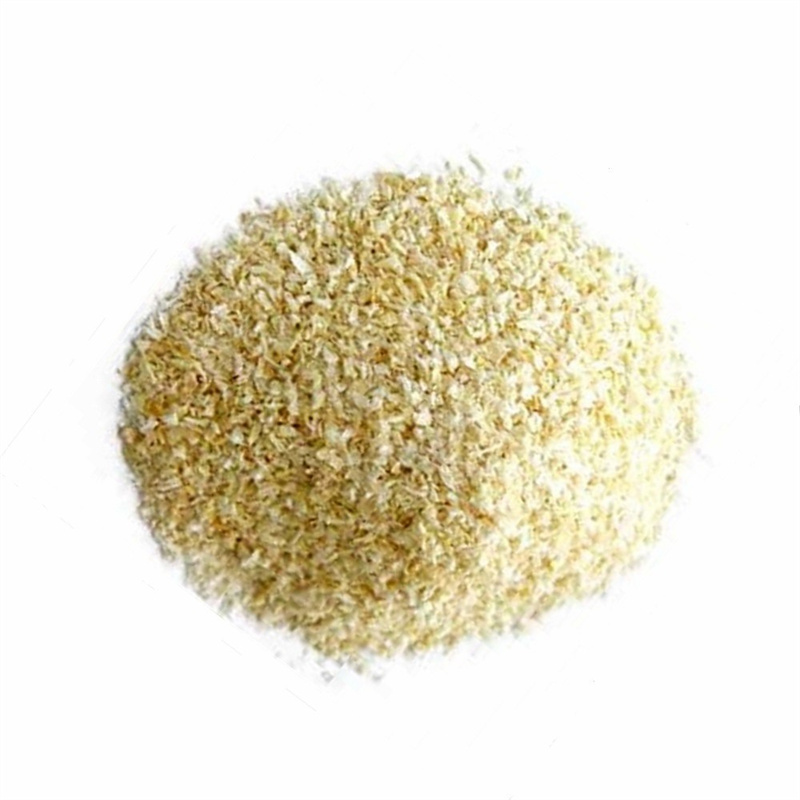 Granuli di aglio disidratato essiccati di grado superiore che cucinano ingredienti alimentari Immagine in primo piano