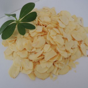 Fiocchi di aglio disidratato bianco vegetale essiccato