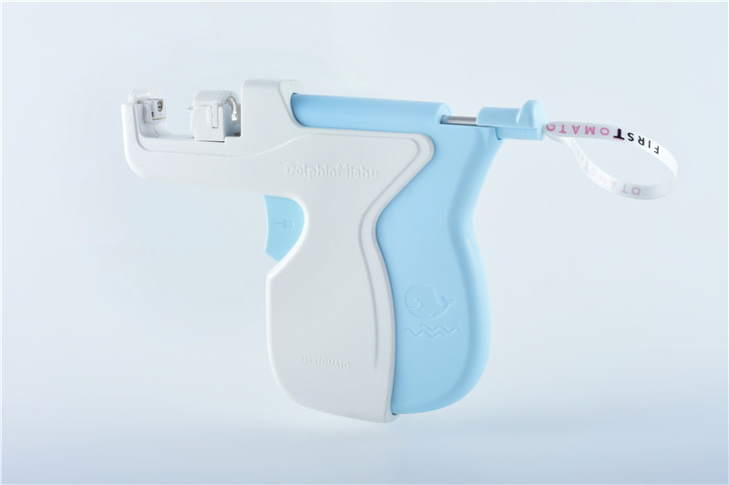 Пиштол за пробивање уши од делфин Мишу Автоматска стерилна безбедносна хигиена Лесно користење Лична нежна избрана слика
