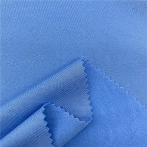 Brušena poliestrska tkanina iz elastana v barvi breskve