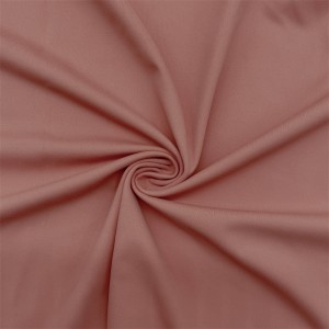 75% nylon 25% elastan tkanina interlock w kolorze brzoskwiniowym na legginsy sportowe