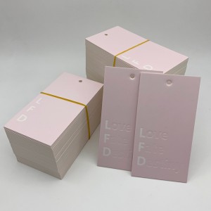 800g गुलाबी कोटेड पेपर ग्रेव्यूर प्रिंटिंग कपडे टॅग अॅक्सेसरीज कस्टमायझेशनला समर्थन देतात