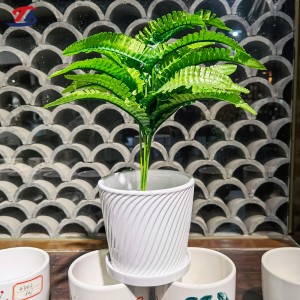 Striped white ceramic flowerpot with drain base
