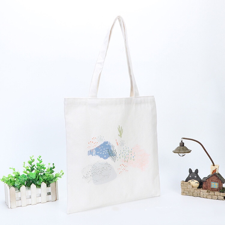 सुंदर मुद्रण कपास रचनात्मक कोरियाई शैली पर्यावरण थोक शॉपिंग बैग के साथ चीन कारखाने कस्टम शुद्ध रंग