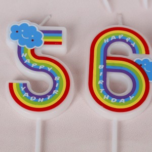 Fornite una candela di torta d'anniversariu arcobalenu culurita per a decorazione di festa