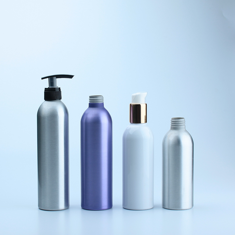 Empty shampoo and conditioner bottles with lotion pump