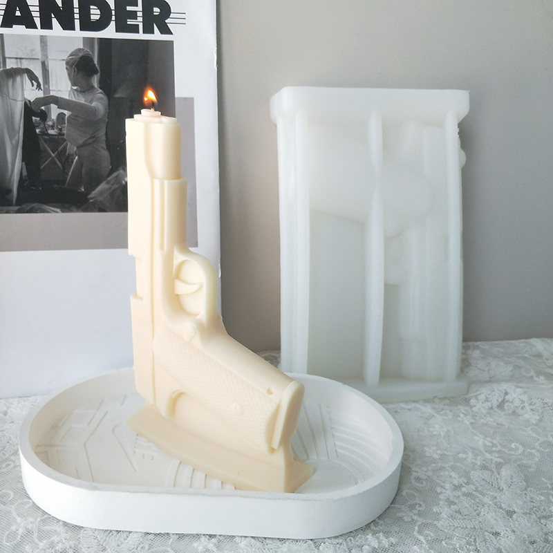 J1187 ဒီဇိုင်းသစ် DIY အိမ်အလှဆင်ပလပ်စတာ ဖယောင်းတိုင်မှို 3D Gun Silicone Candle Mold