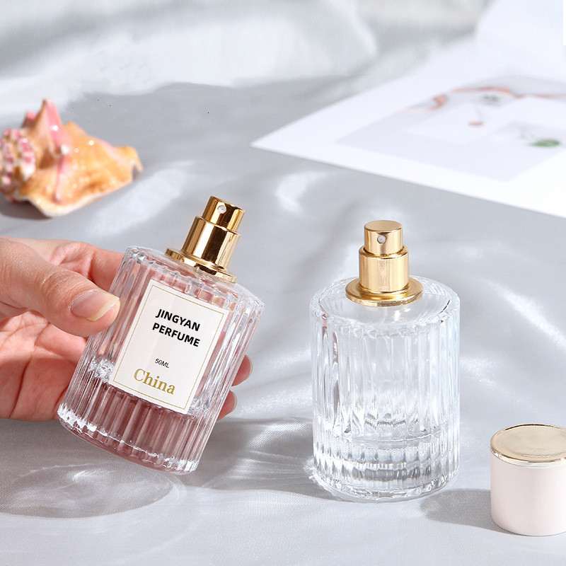 30ml, 50ml Vertical Stripe Embossed Elegant Ladies Cylinder Glass Spray Perfume Bottle Featured Image